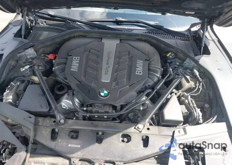 2015 BMW 750Li z USA, uszkodzony, nr VIN WBAYE8C55FD782482